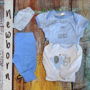 Set of gently warn blue newborn baby clothes